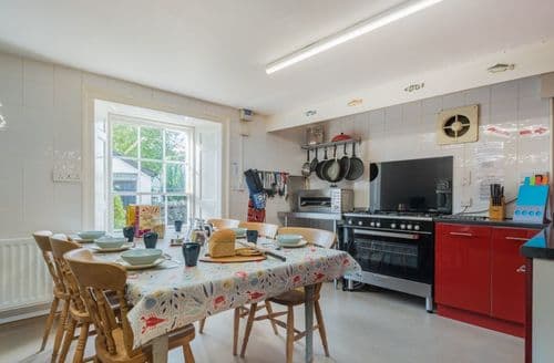 The large kitchen includes a breakfast table