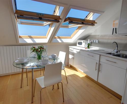 Kitchen/ Dining Area - View 1