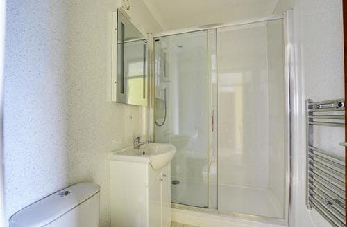 Spacious walk in shower.