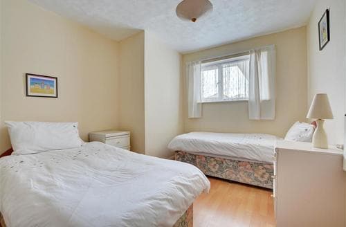 Twin bedroom also with built in wardrobe.