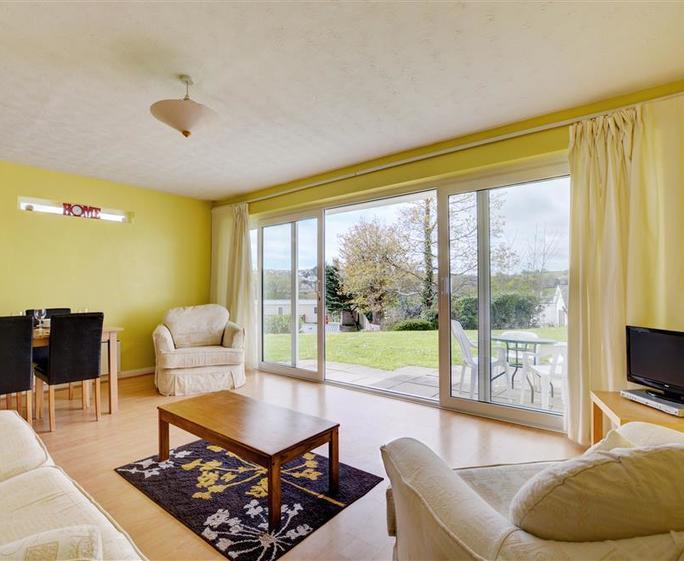 Living space which looks out to the patio