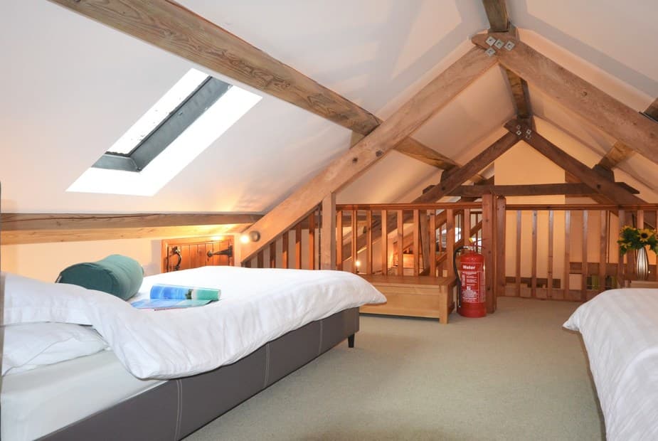 1 twin mezzanine with low beams, en-suite shower room with WC, accessed from the lounge