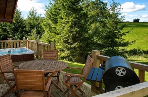 Decking with private hot tub, seating and BBQ