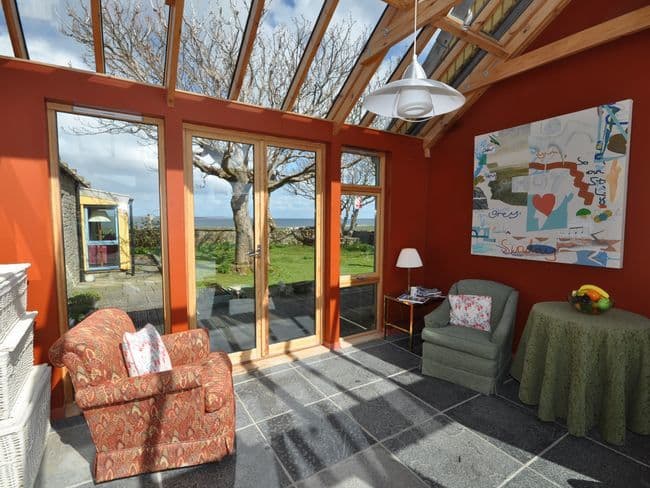Conservatory with views and patio doors to garden