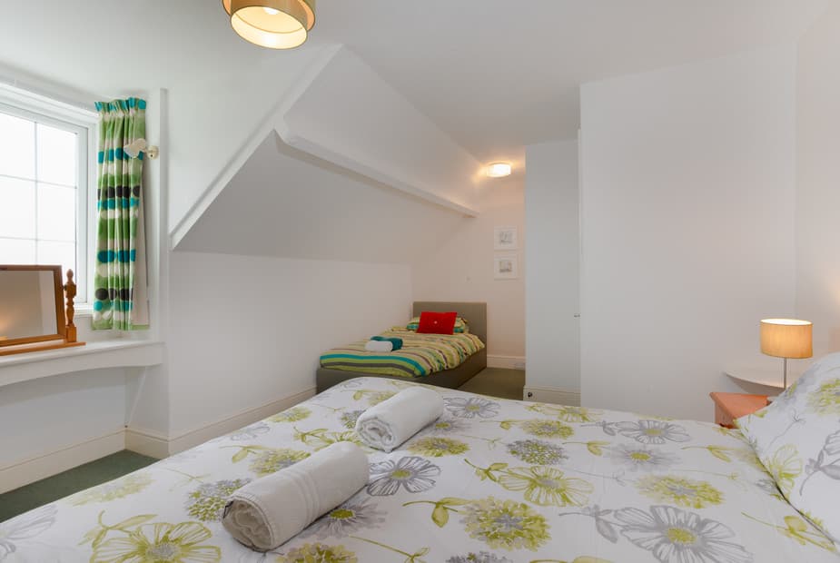 The family room showing single bed