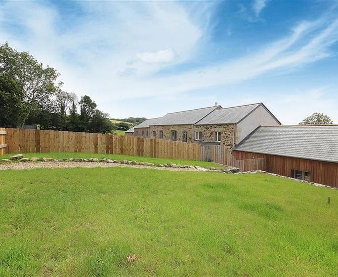 Rear partially enclosed garden
