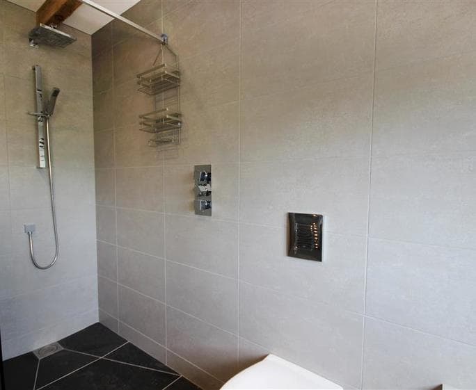 Walk in shower in bathroom