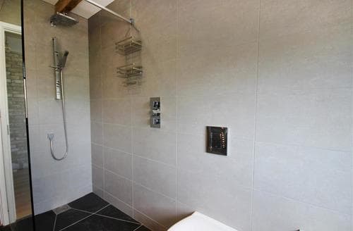 Walk in shower in bathroom
