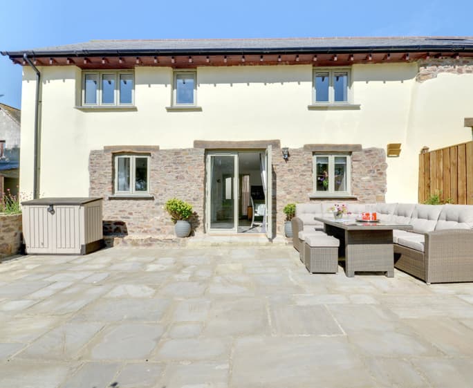 Outside you have your own private patio with barbecue, comfortable seating and large table 
