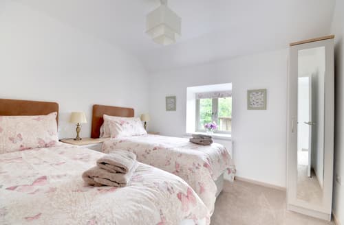 The pretty twin bedroom with countryside views