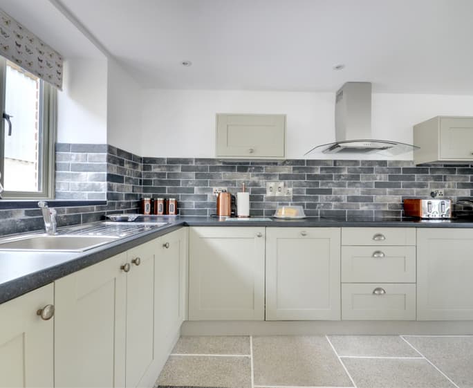 The well equipped spacious kitchen
