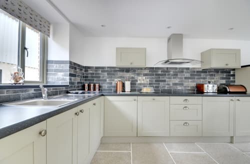 The well equipped spacious kitchen