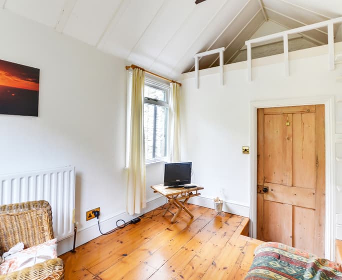 The property benefits from a snug room that the children can relax in and enjoy a good film