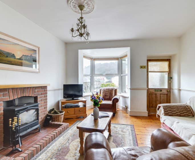 The accommodation is bright and welcoming with stripped pine polished floors and many original features throughout