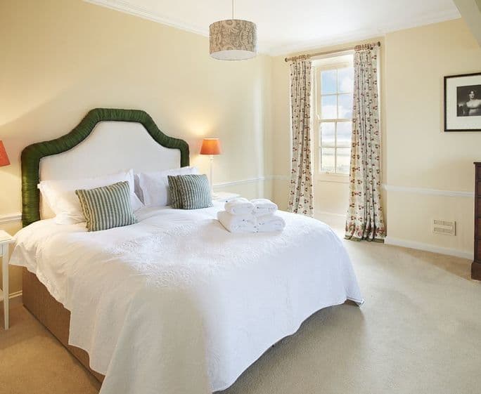 First floor: Bedroom one with super king bed and en-suite bathroom