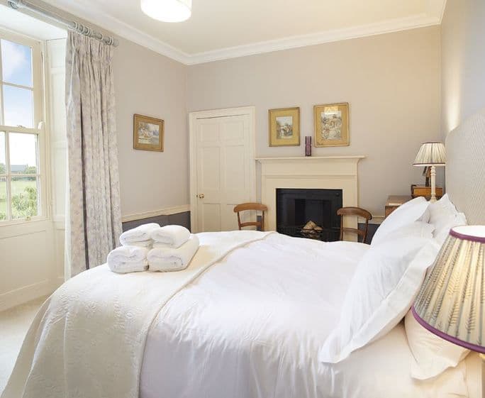 First floor: Bedroom two with king size bed and en-suite shower room