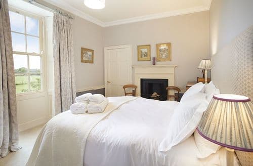 First floor: Bedroom two with king size bed and en-suite shower room
