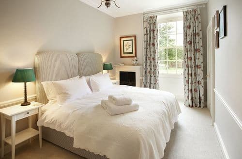 First floor: Bedroom three with zip and link bed that can be configured as a king size bed or two 2'6 single beds