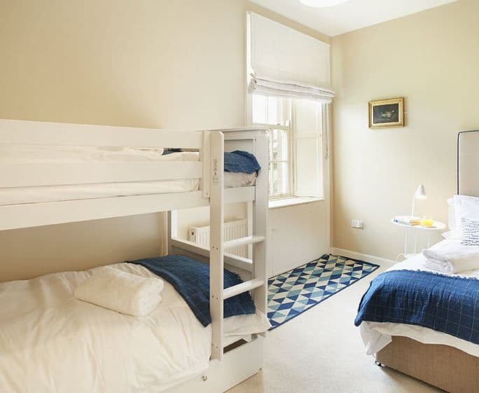First floor: Bedroom five with 3' bunk beds and 3' single bed
