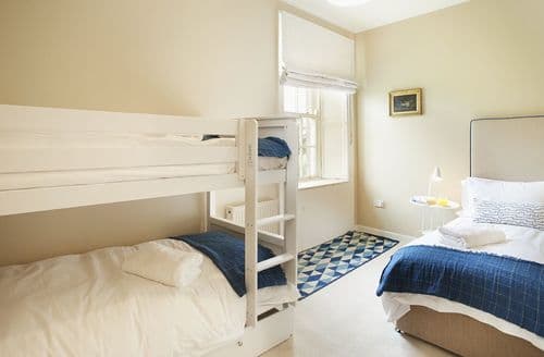 First floor: Bedroom five with 3' bunk beds and 3' single bed
