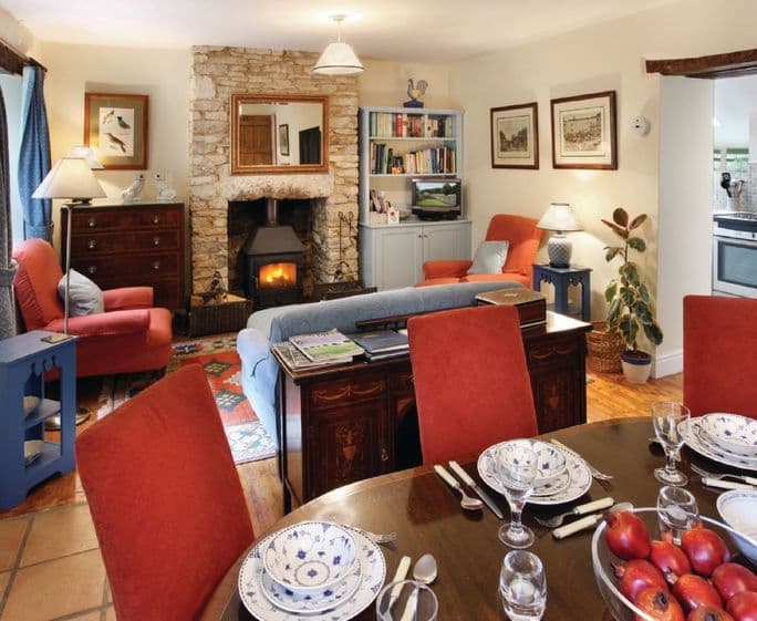Ground floor:  Sitting room with wood burning stove and dining area