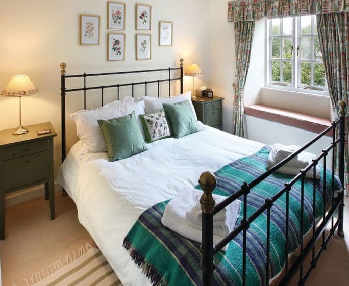 First floor: Double bedroom with 6' bed