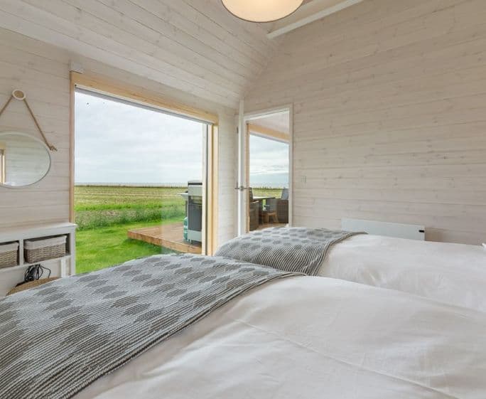 Super king zip and link beds, sea views and en suite with shower.