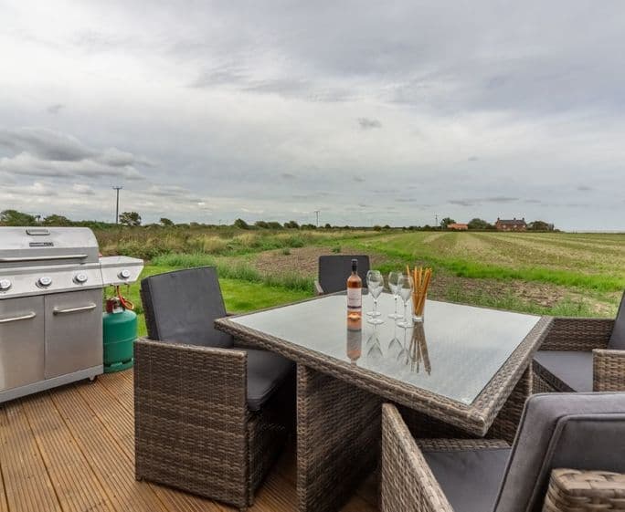Decked terrace with garden furniture