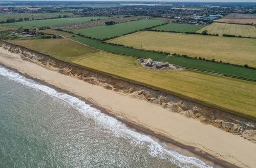 Views from the skies above the sea looking back towards the stunning new buildings