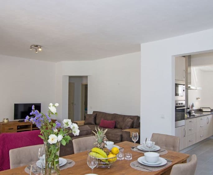 Ground floor: Open plan living/dining area leading to modern fitted kitchen