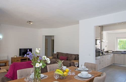 Ground floor: Open plan living/dining area leading to modern fitted kitchen