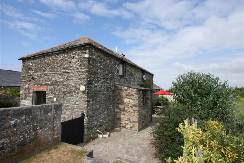 Rear view of property and garden