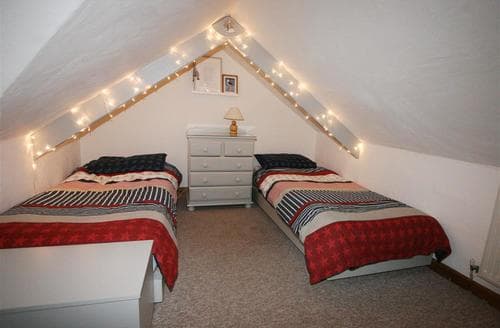 Twin bedroom at night