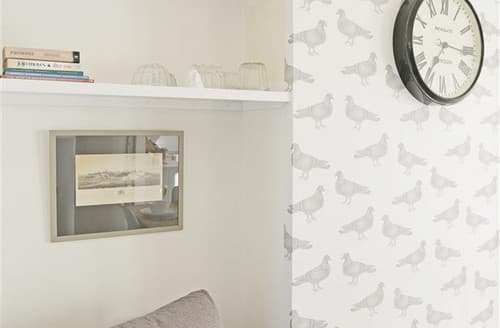 Cosy Chair and Feature Wallpaper