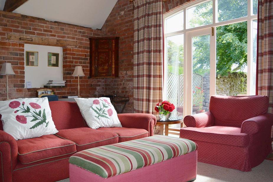 The Coach House Spacious sitting room | The Coach House - Upton Cressett Hall Cottages, Upton Cressett, near Bridgnorth