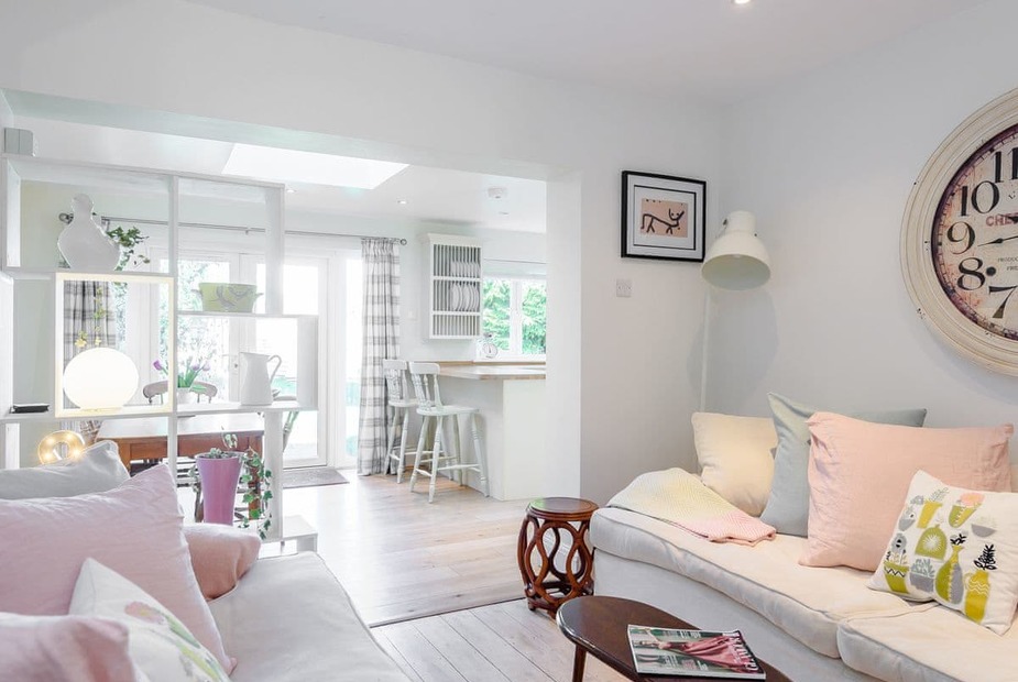 Whyke House Sitting room and dining area | Whyke Cottage, Chichester