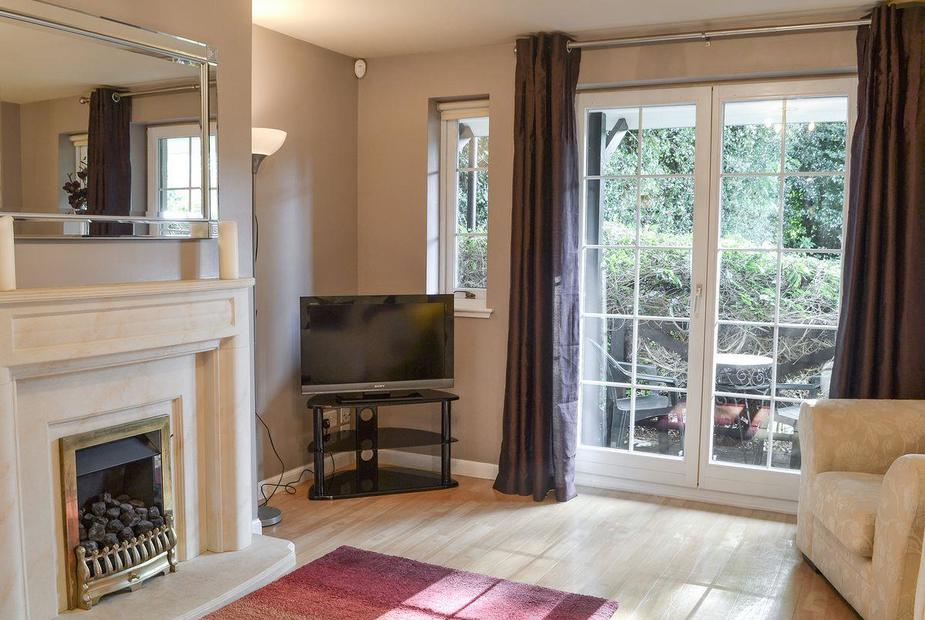 The Edens Living room with French doors | The Edens, Inverness