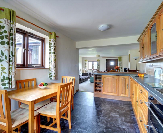 Trewin Court The kitchen also has a dining table, the perfect spot for breakfast!
