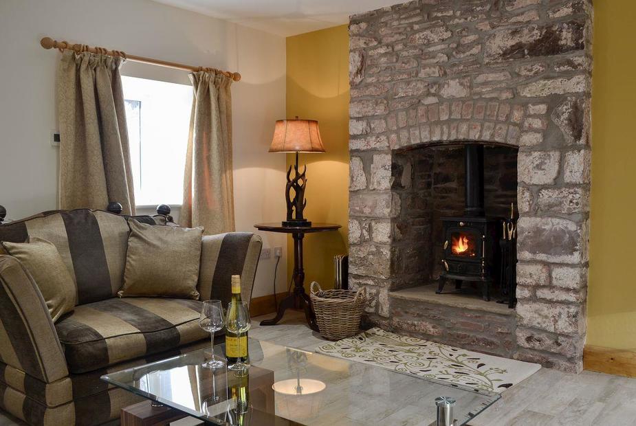 Holly Cottage Cosy living room with wood burner | Holly Cottage, Merthyr Cynog, near Brecon