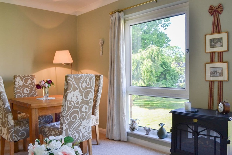 Wickham Croft Modest dining area with views over the grounds | Wickham Croft, Wickham, near Fareham