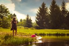 A girl playing in the parks, one of the things to do in the Lake District for families