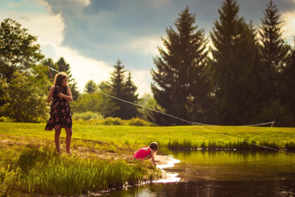 A girl playing in the parks, one of the things to do in the Lake District for families