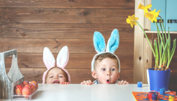 Two kids enjoying their best Easter family holiday