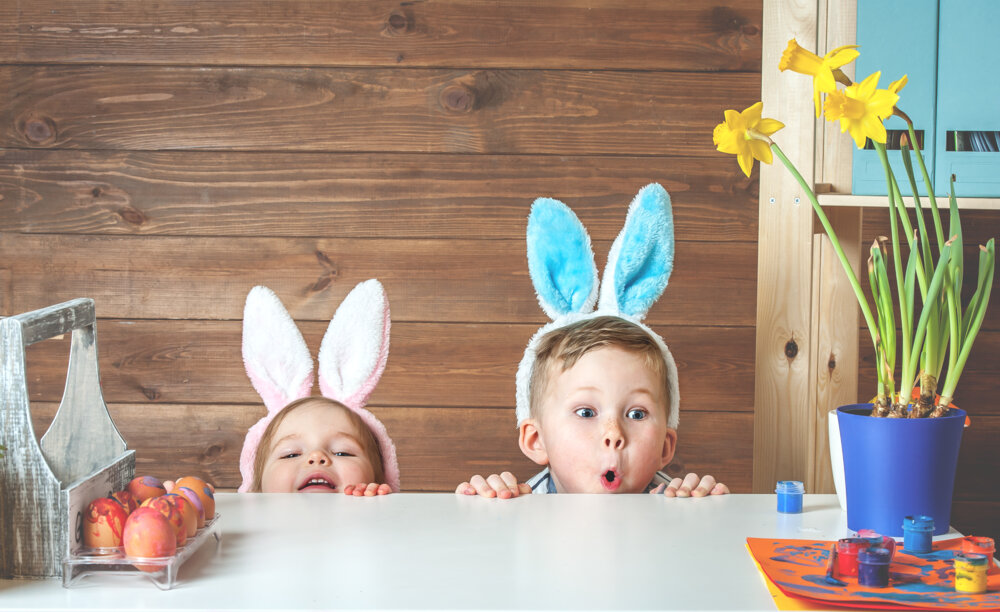 Two kids enjoying their best Easter family holiday